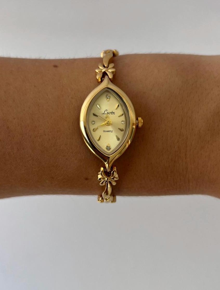 Montre vintage délicate en or, montre femme ancienne