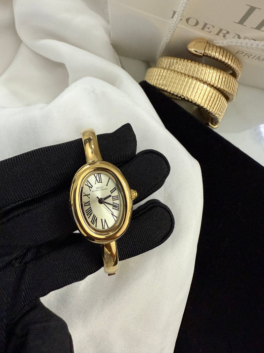 Gold bangle and gold dial watch watch | Vintage inspired