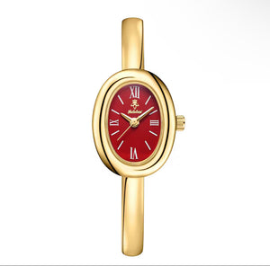 Gold red dial