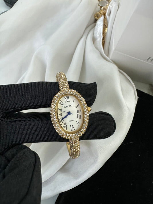 Gold bangle watch watch | Vintage inspired