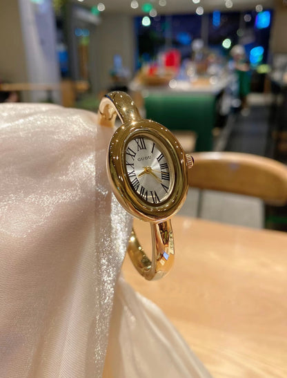 Gold bangle watch watch | Vintage inspired