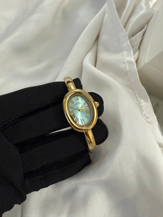 Gold bangle cyan watch watch | Vintage inspired