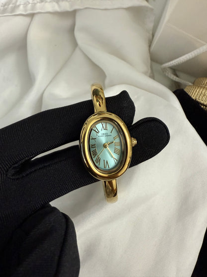 Gold bangle cyan watch watch | Vintage inspired