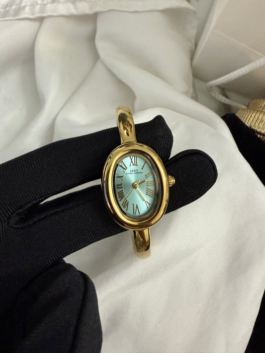 Gold bangle cyan watch watch | Vintage inspired
