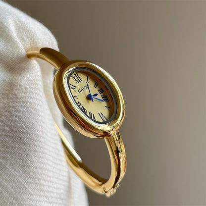 Gold bangle watch watch | Vintage inspired