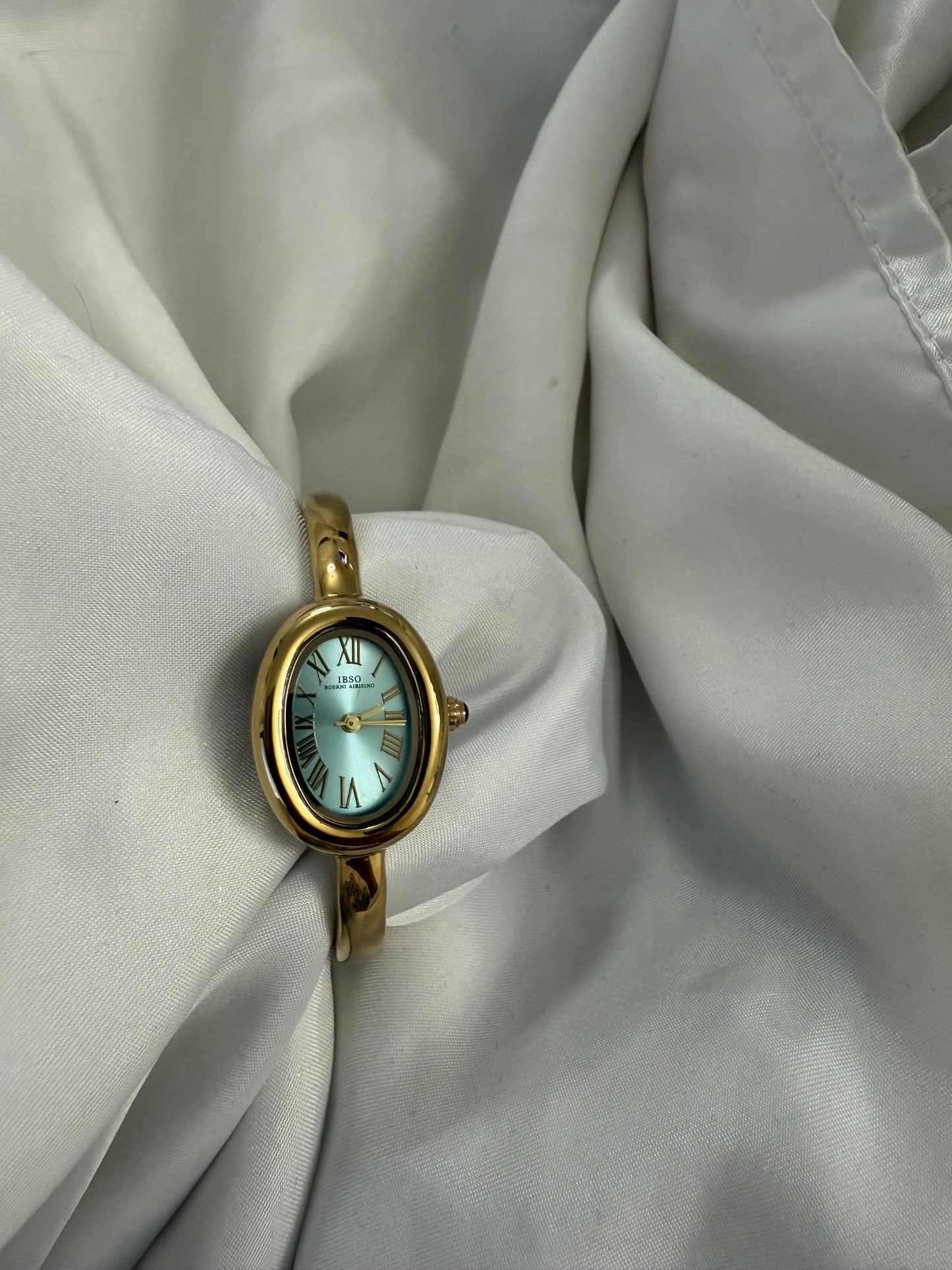 Gold bangle cyan watch watch | Vintage inspired