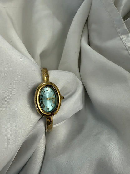 Gold bangle cyan watch watch | Vintage inspired