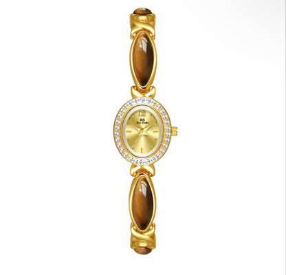 Montre vintage en or délicat, montre pour femme avec pierres précieuses