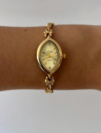 Montre vintage délicate en or, montre femme ancienne