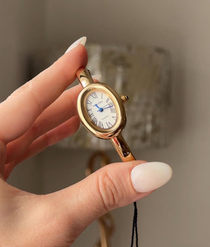 gold with white dial