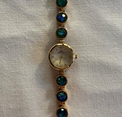 Montre vintage délicate en or, montre ancienne en ormeau