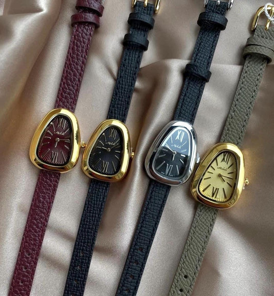 Montre vintage délicate, montre en or ancienne, montre en cuir de serpent